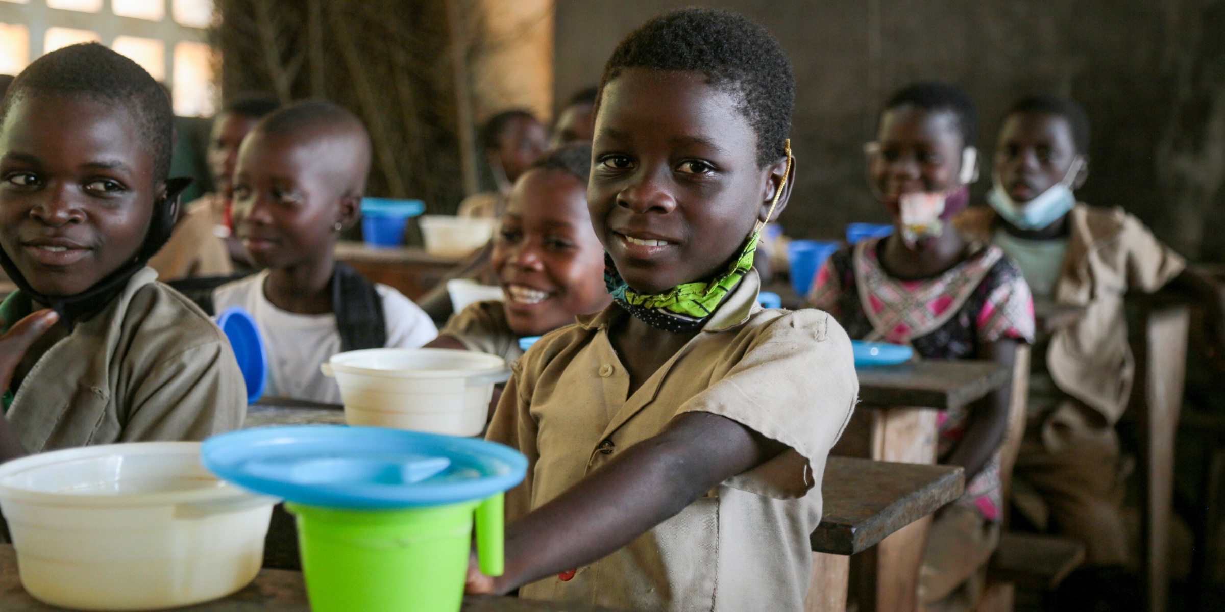 A student eats his lunch in Kpessou, in the maritime region of Togo. Credit: World Bank